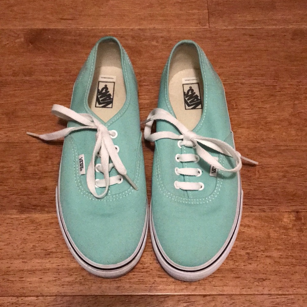 Teal Vans sneakers